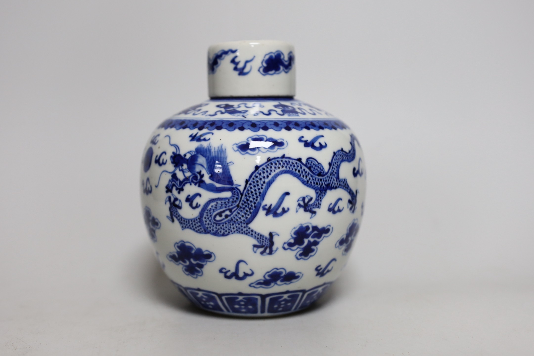 A Chinese blue and white ‘dragon’ jar and cover, 19th century, 18cm tall